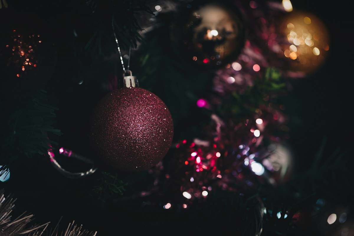 ornament baubles hung on Christmas tree tree